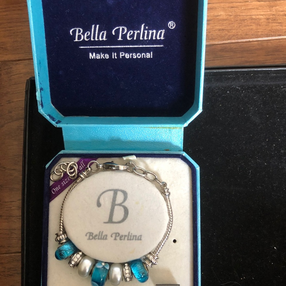 Bracelet with beads to be added or taken off. Purchased but never worn.